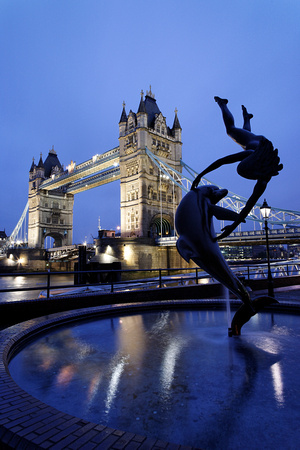 Girl with Dolphin Statue and Tower Bridge